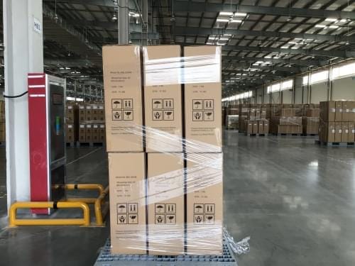 Packed and wrapped wheelchair on pallet, ready for international shipping